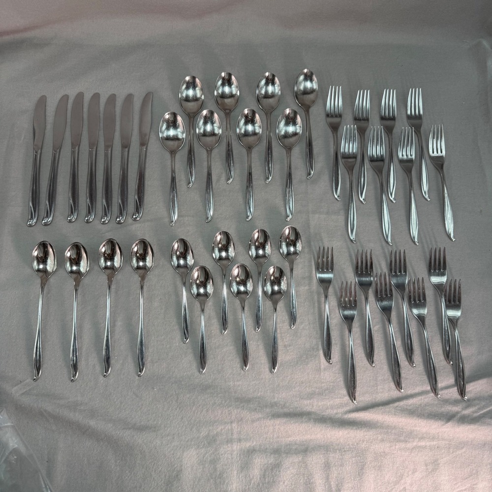 International Silver 42 Piece Tradewinds Jamaica Stainless Swirl Flatware Set